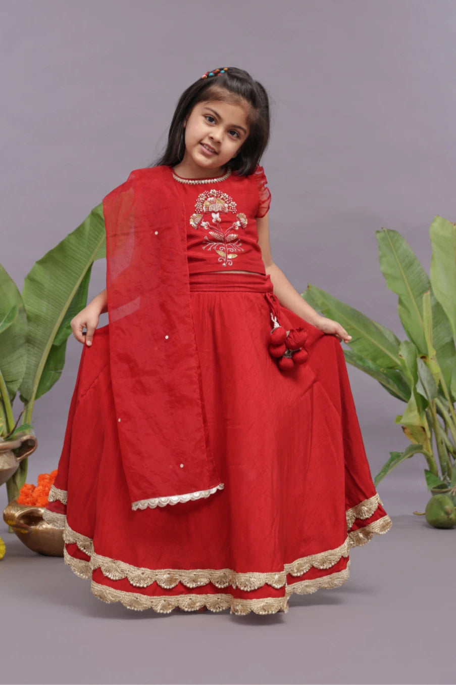 Gold work Embroidered Silk Lehenga and Blouse in Red