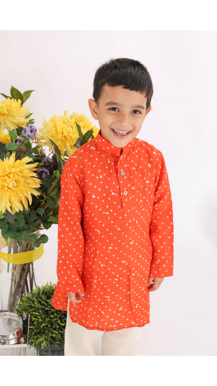 Orange Silk Bandhani Print Kurta with Sequence Embroidery and White Pyjama for Boys