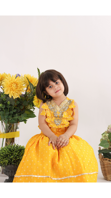Heavy Embroidered Top with Stunning 3d Cutwork Petals and Lehenga in Yellow Printed Silk Bandhani for Girls
