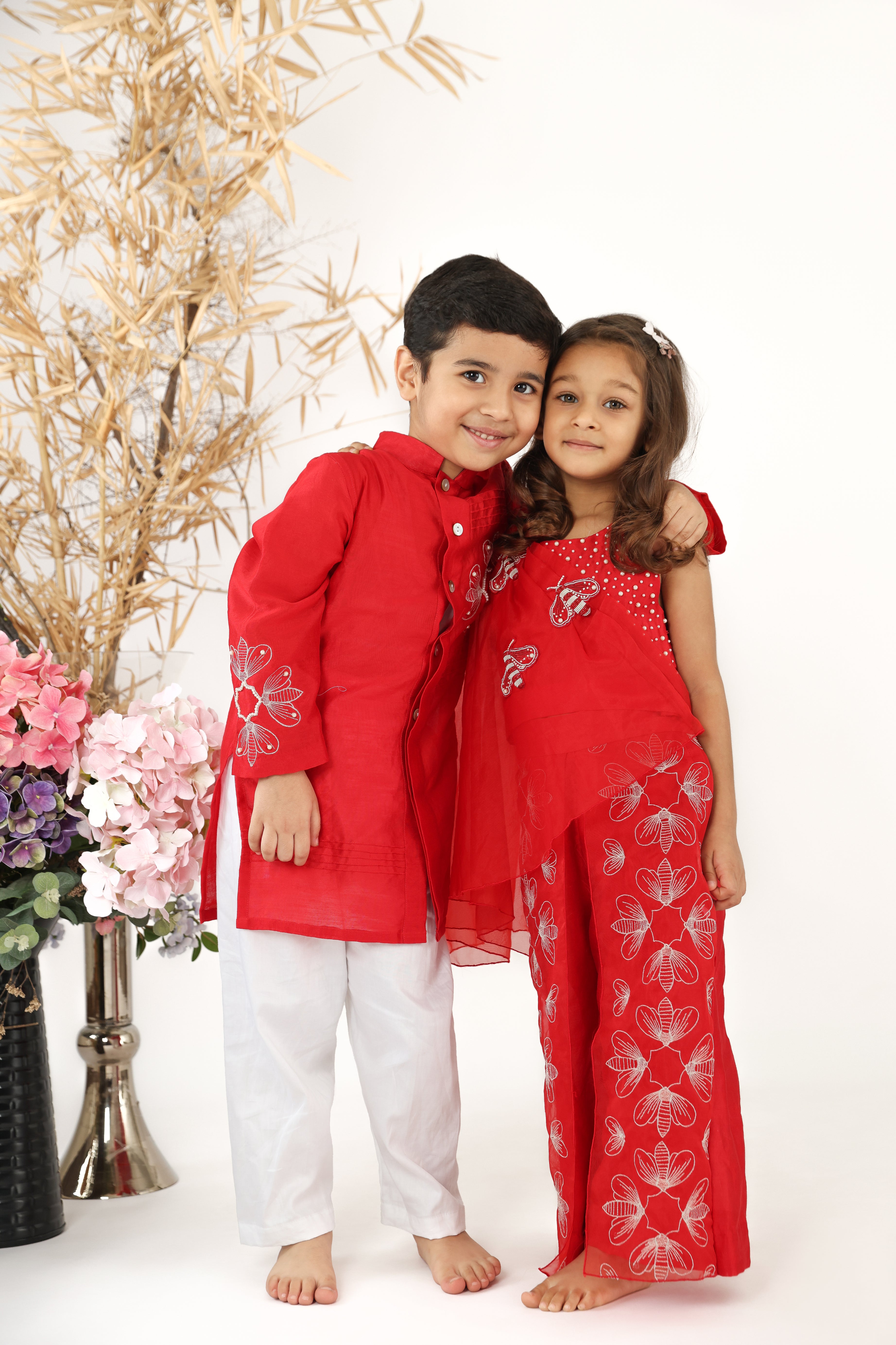 Twinning in Red Organza Embroidered Drape Top and Palazzo with Achkan Style Kurta and Pyjama