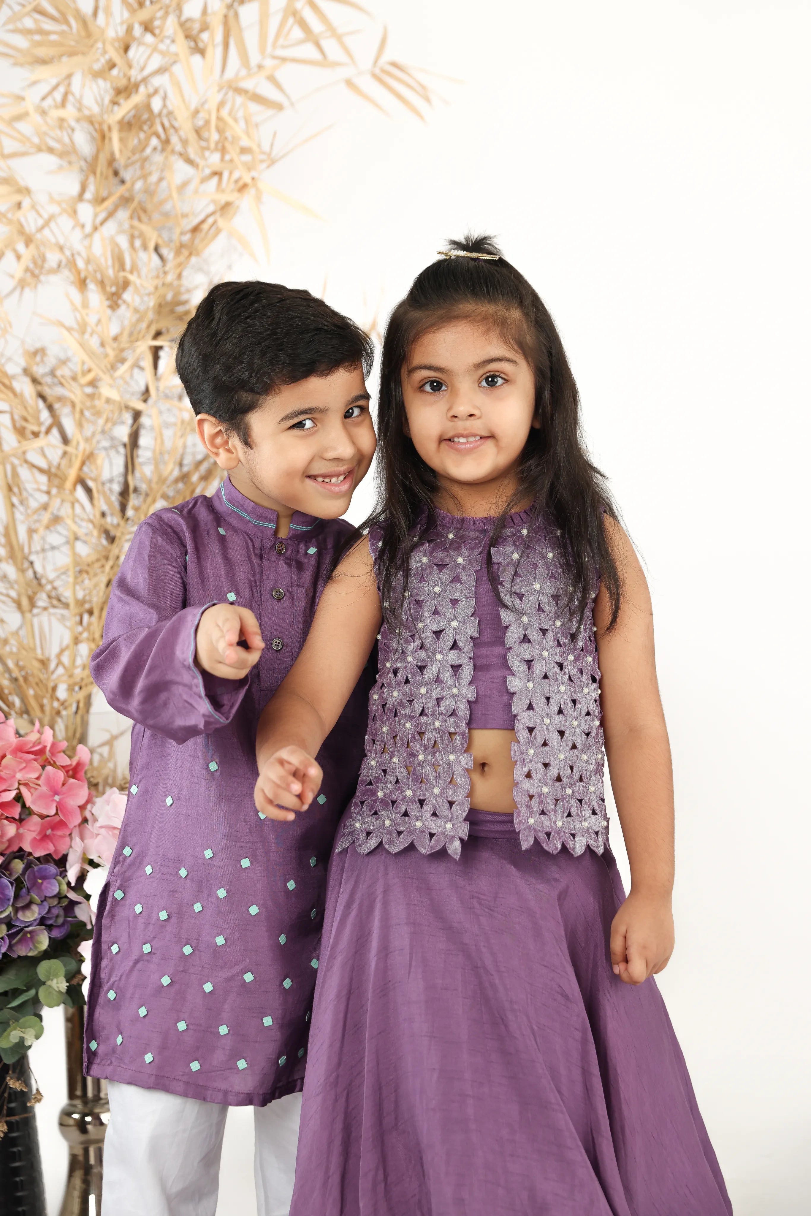 Twinning in Beautiful Leather Sequence Embroidered Purple Silk Kurta with White Pyjama and Hand Embroidered Top with Lehenga