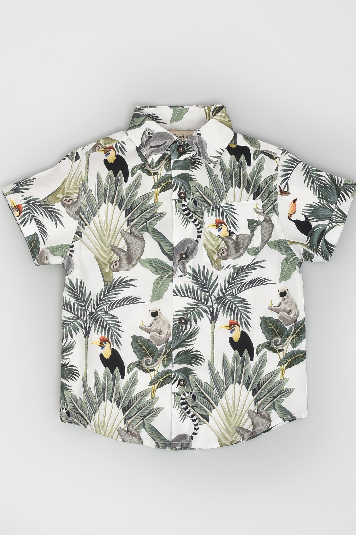 طقم قميص وسروال قصير بطبعة استوائية مناسب للسفر للأولاد