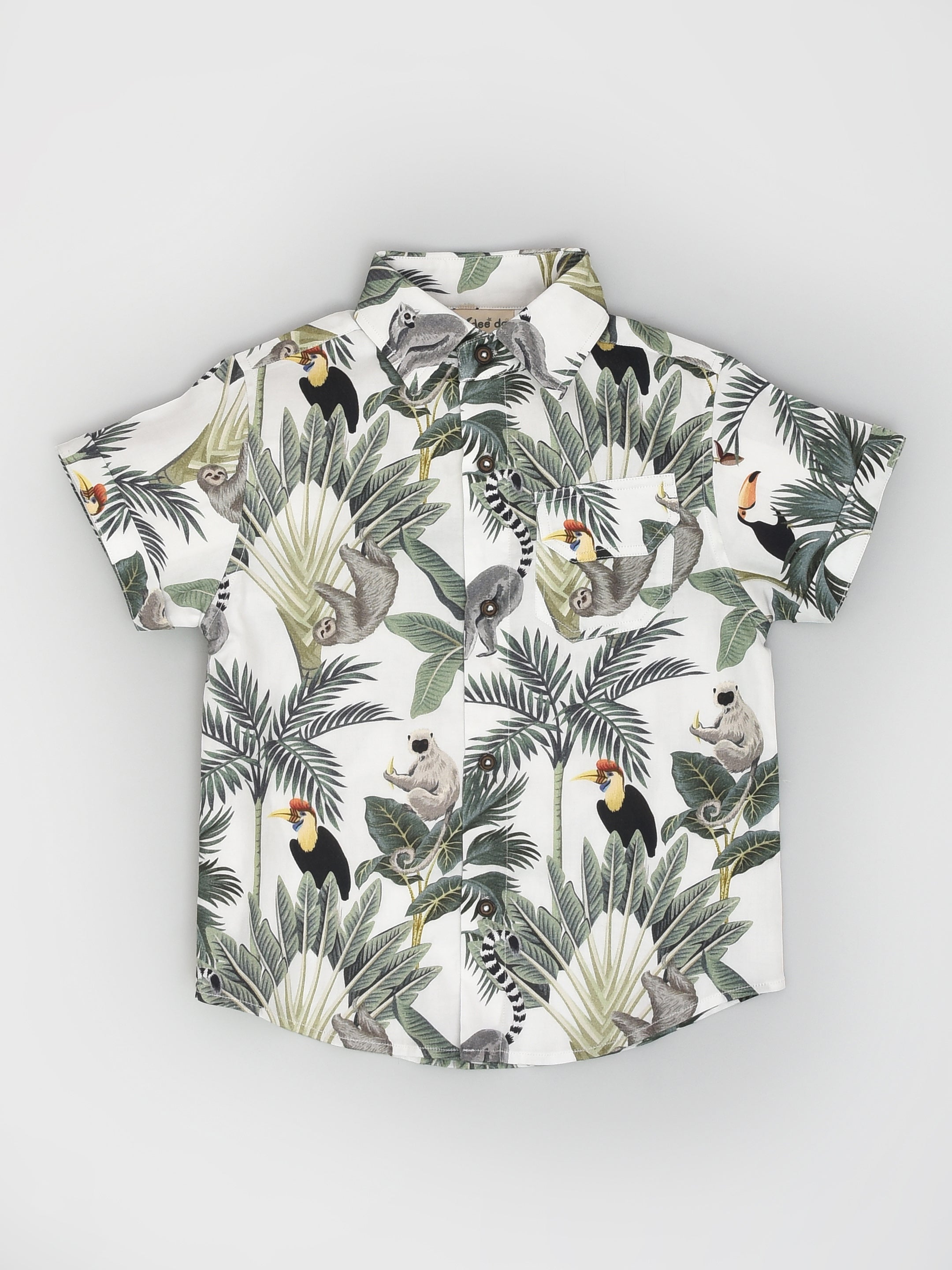 طقم قميص وسروال قصير بطبعة استوائية مناسب للسفر للأولاد